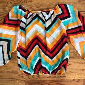 Chevron off shoulder or on top